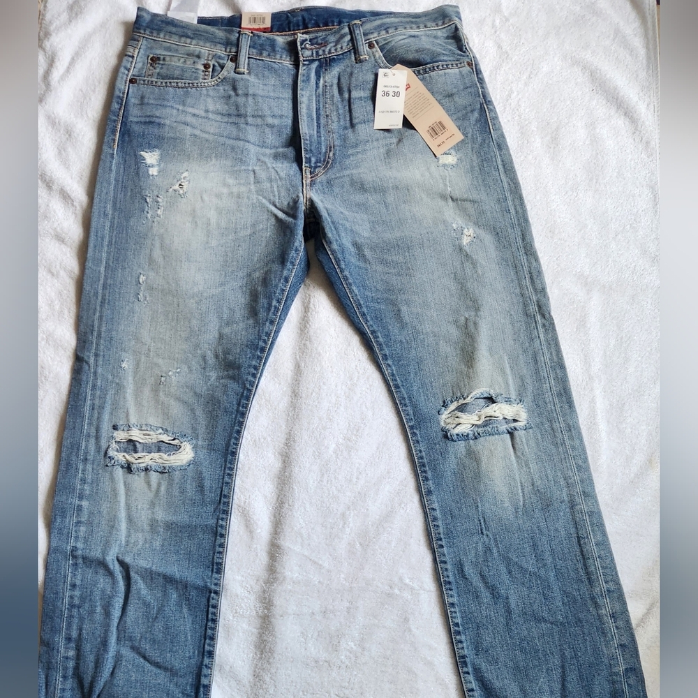 Distressed Blue Jeans
